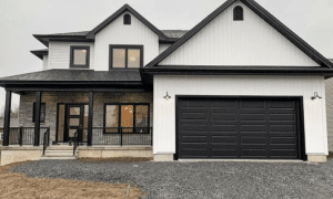 Black Garage Doors on White House Design