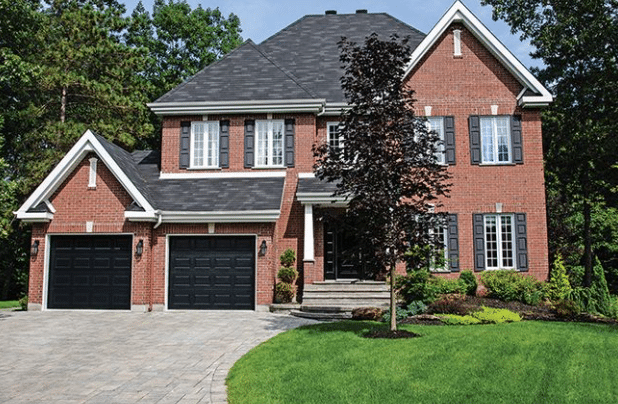 Black Garage Doors & Red Brick